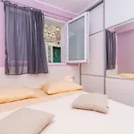 Ina *